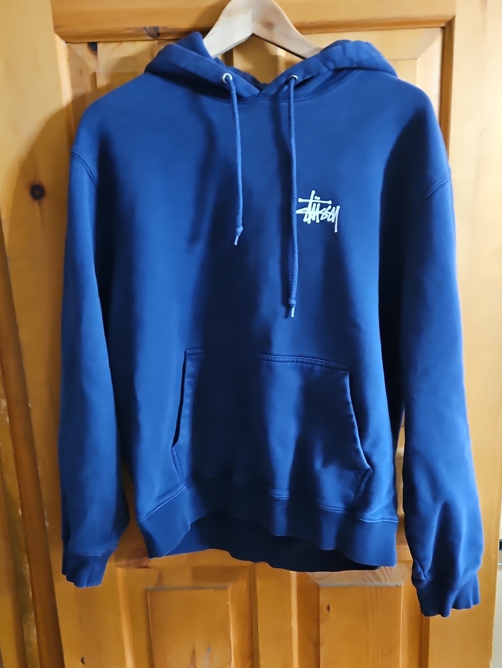 Stussy Navy Blue Pullover Hoodie with Small Script Logo